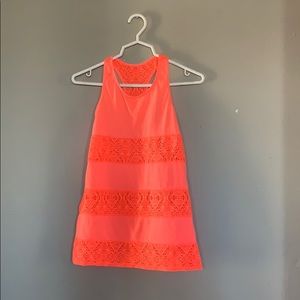 Neon pink swimwear cover-up with lace details